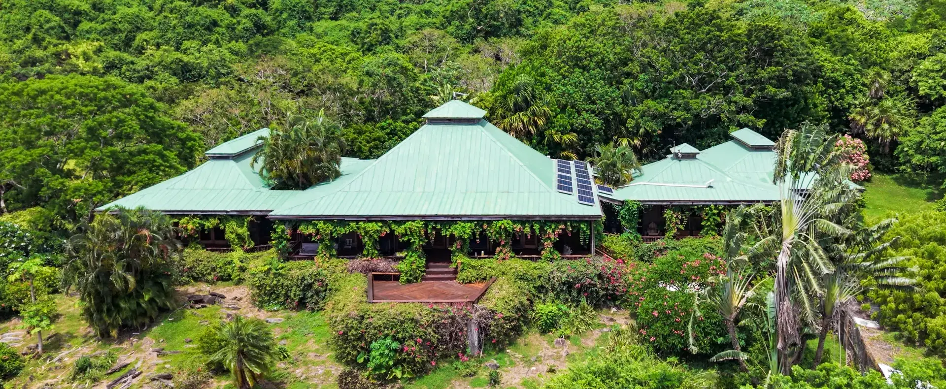 Main house with green roof, 122-acre beachfront estate, Guanaja
